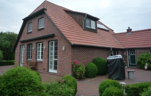 Einfamilienhaus, Einfamilienhaus mit Nebengebäuden in Stadland — Bild 3