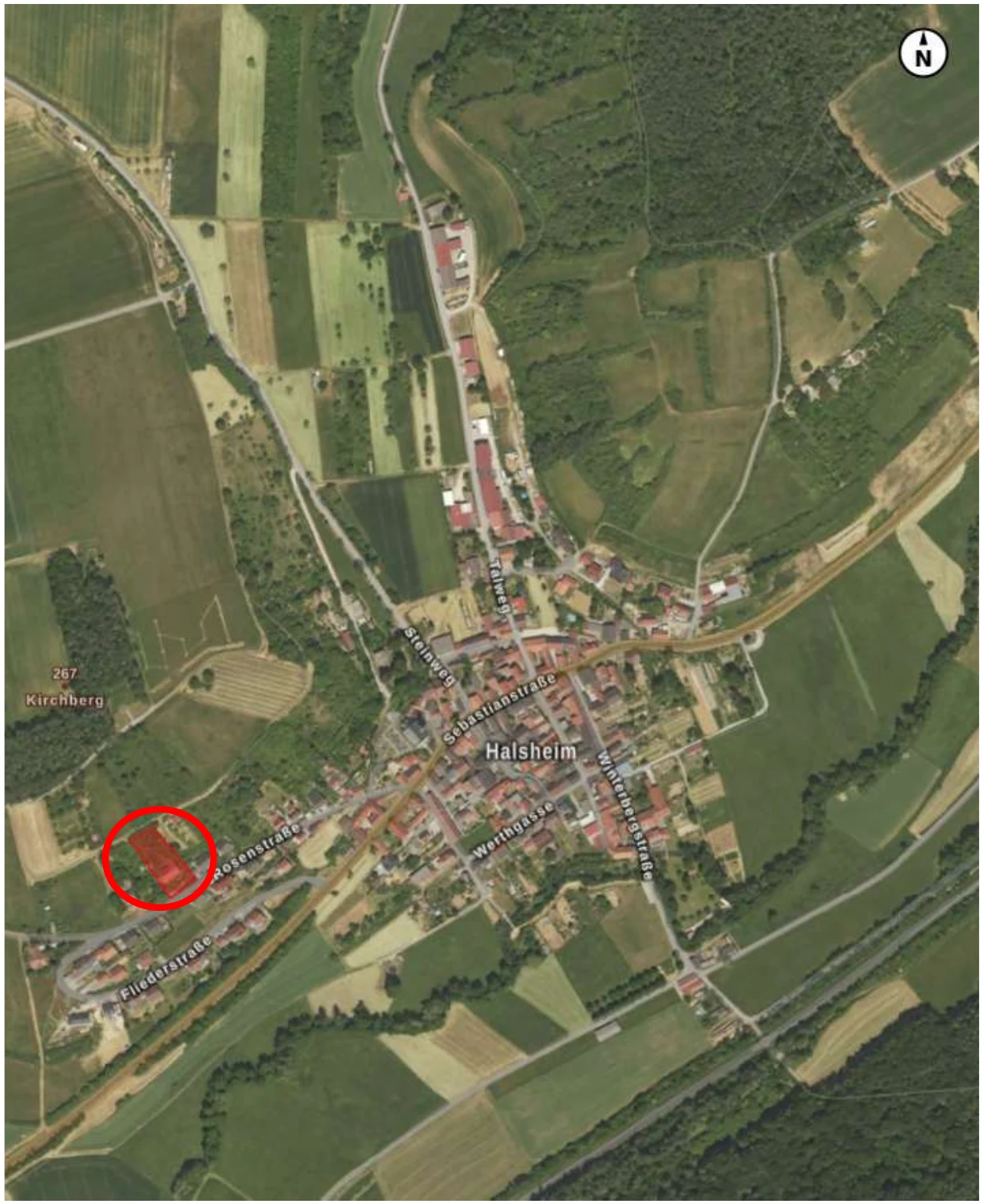 unbebautes Grundstück sowie Wohnungen in Mehrfamilienhaus in Arnstein
