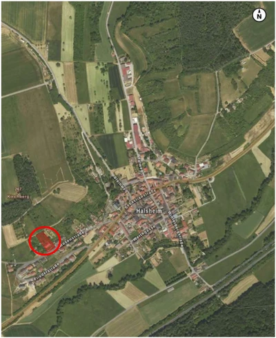 unbebautes Grundstück sowie Wohnungen in Mehrfamilienhaus in Arnstein