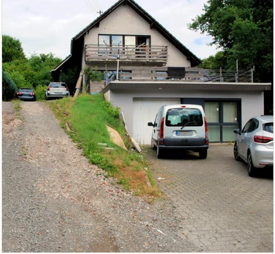 Mehrfamilienhaus, Garage, Baugrundstück in Windeck