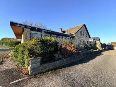 Zweifamilienhaus, gewerblich genutztes Grundstück, Garage in Löhne