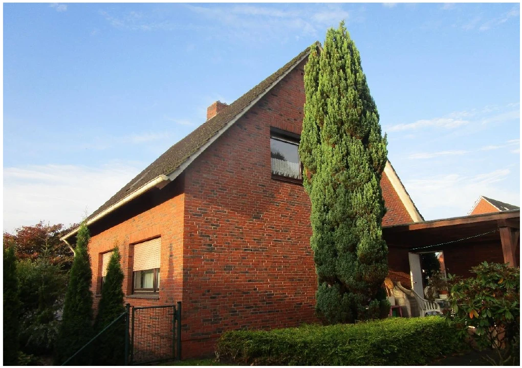 Einfamilienhaus mit Einliegerwohnung und Nebengebäude in Papenburg — Bild 2