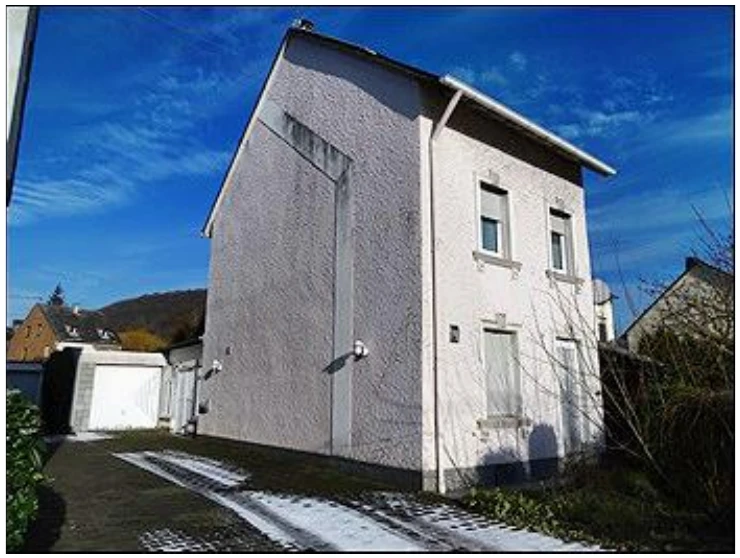 Einfamilienhaus mit Einliegerwohnung und Garage nebst unbebautem Grundstück in Trier — Bild 2