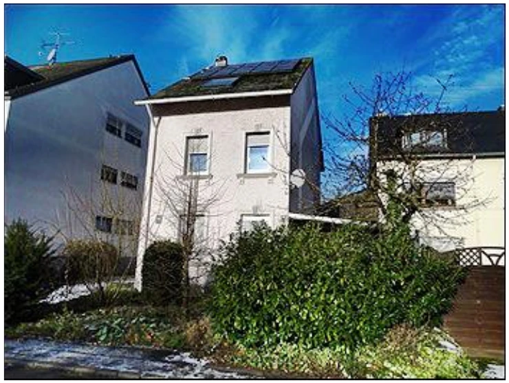 Einfamilienhaus mit Einliegerwohnung und Garage nebst unbebautem Grundstück in Trier — Bild 3