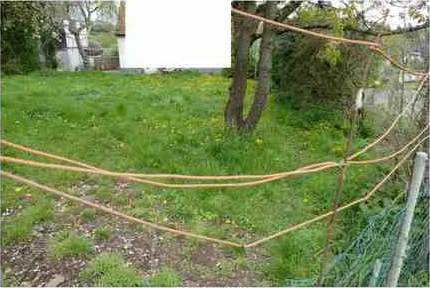Einfamilienhaus, unbebautes Grundstück in Romrod