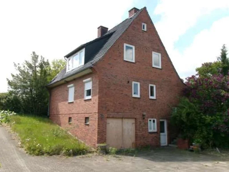 Einfamilienhaus mit Einliegerwohnung in Fockbek — Bild 2