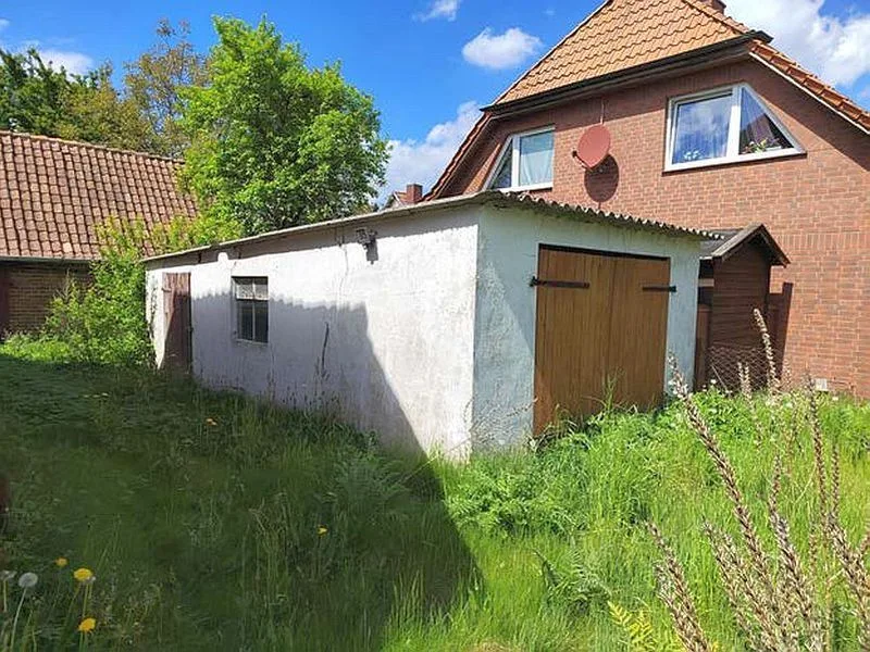 Einfamilienhaus mit 2 Nebengebäuden und Ackerland in Kuhstorf — Bild 2