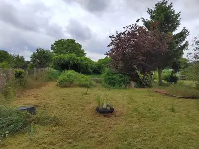 Einfamilienhaus und Gartenland in Neustadt