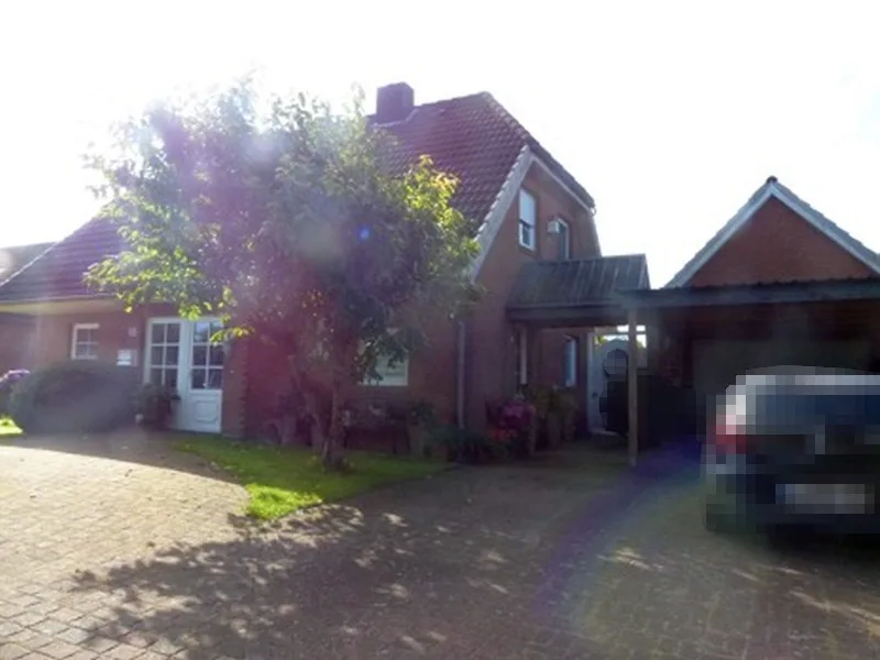 Einfamilienhaus nebst Garage und Carport in Reher — Bild 2