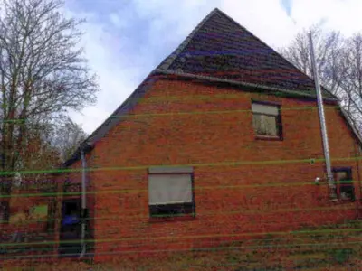 Einfamilienhaus mit Nebengebäuden in Dammfleth