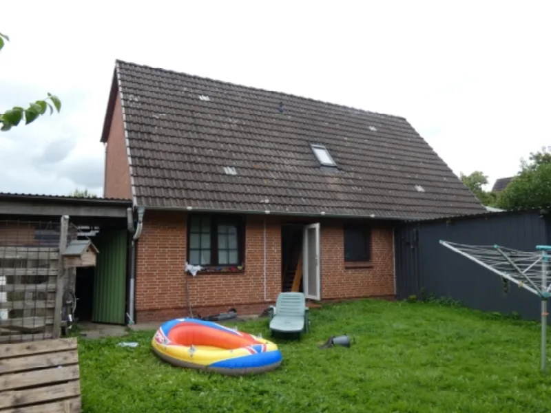 Einfamilienhaus mit Einliegerwohnung und Garage in Meldorf — Bild 2