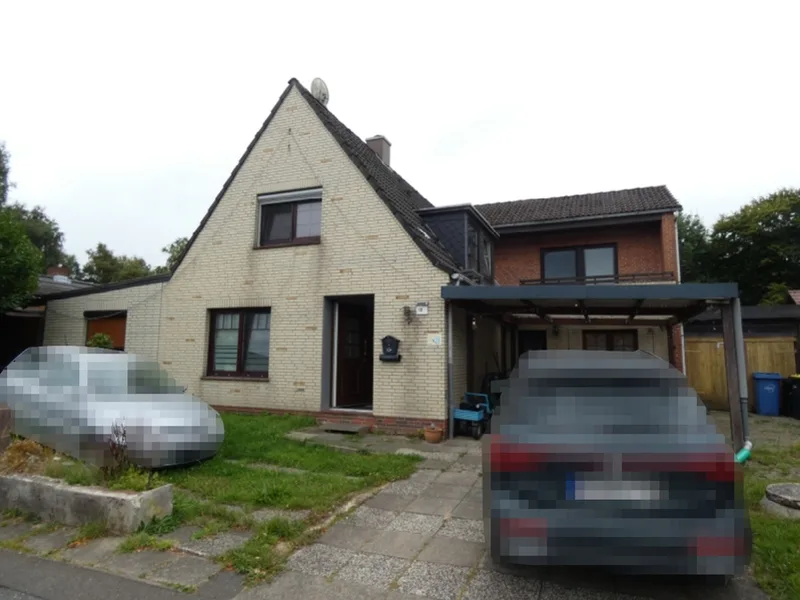 Einfamilienhaus mit Einliegerwohnung und Garage in Meldorf — Bild 3