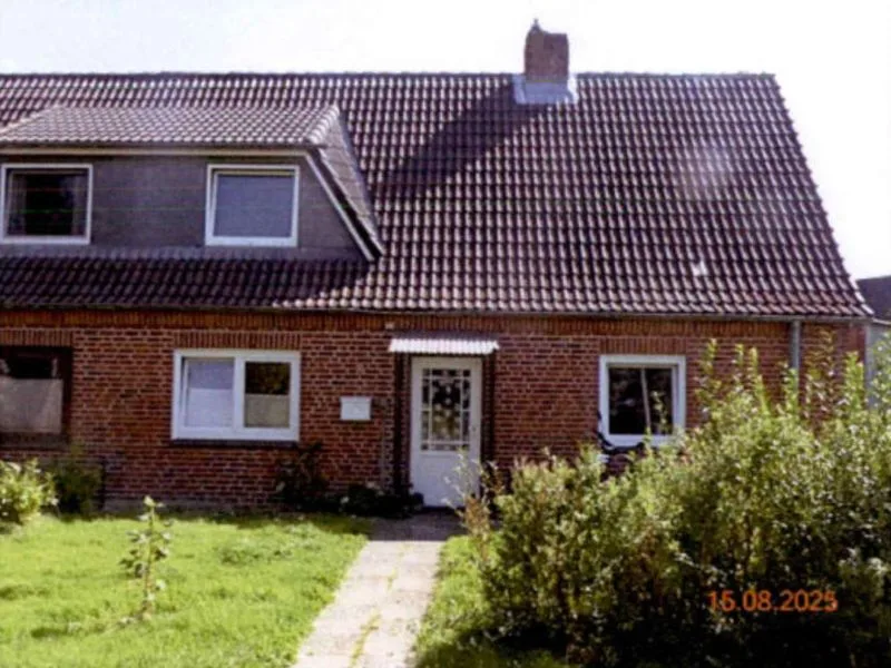 Doppelhaushälfte mit Garage und Schuppenanbau in Diekhusen — Bild 3