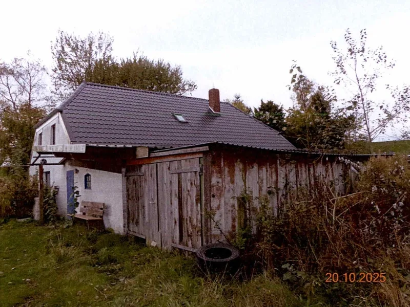 Älteres Einfamilienhaus mit Anbauten und Garage in Brunsbüttel