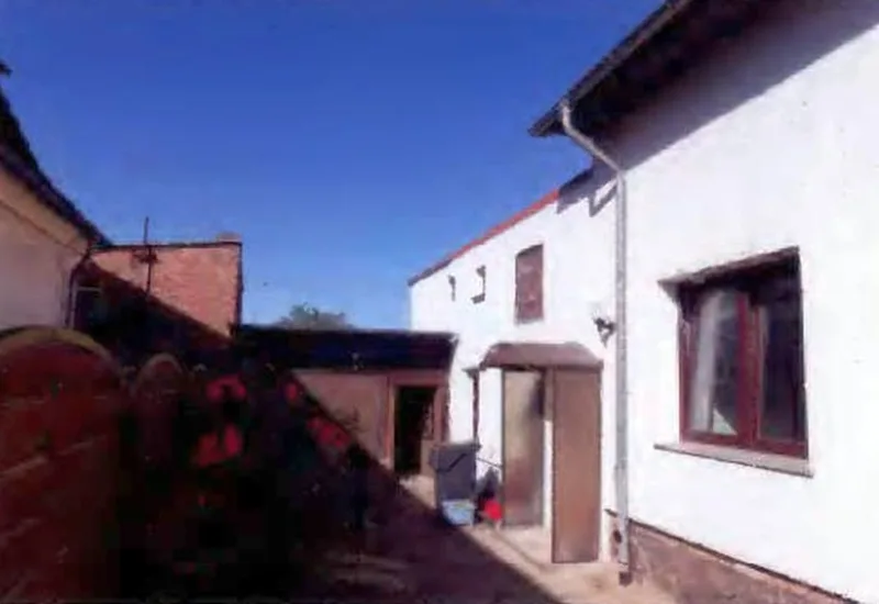 Doppelhaushälfte mit Nebengebäuden in Gützkow — Bild 2