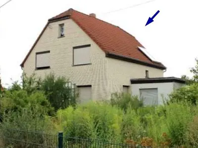 Einfamilienhaus und unbebautes Grundstück in Klostermansfeld