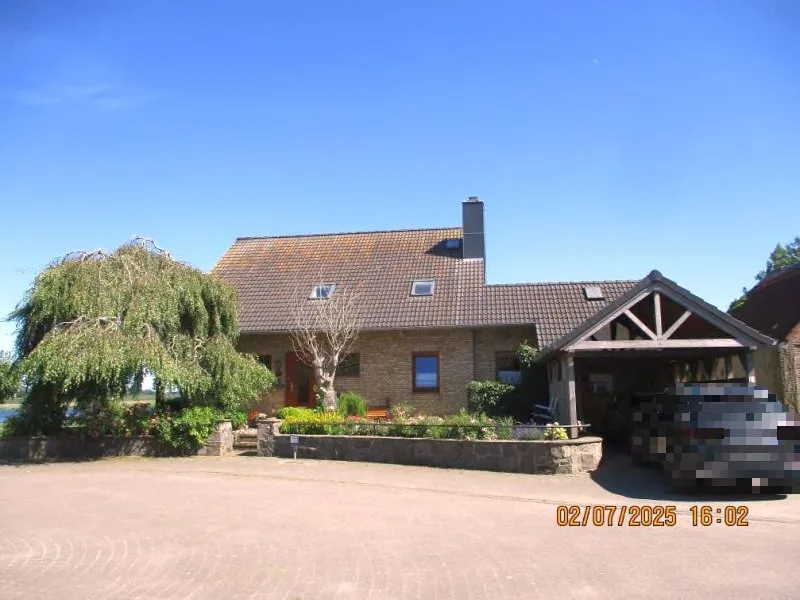 Einfamilienhaus mit Garage und Carport in Arnis — Bild 3