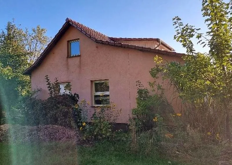 Einfamilienhaus mit Nebengebäuden in Divitz — Bild 3