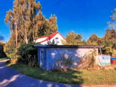 Einfamilienhaus mit Nebengebäuden in Divitz