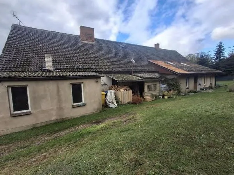 Mehrfamilienwohnhaus mit Nebengebäuden in Casekow OT Woltersdorf — Bild 3