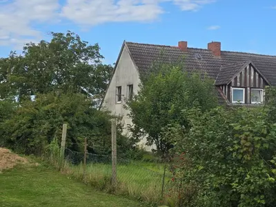 Einfamilienwohnhaus (ehem. Bauernhaus mit Stallteil und Heuboden) in Laage OT Drölitz