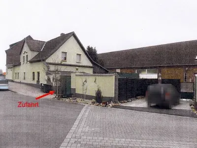 Wohnhaus mit Anbauten und baulichen Außen-/Nebenanlagen in Muldestausee OT Pouch